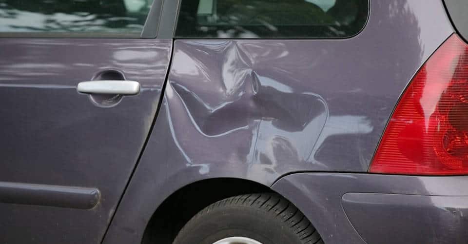 car with dented side 1